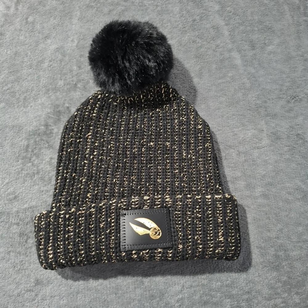 Love Your Melon Harry Potter Snitch Black Metallic Gold Pom Beanie